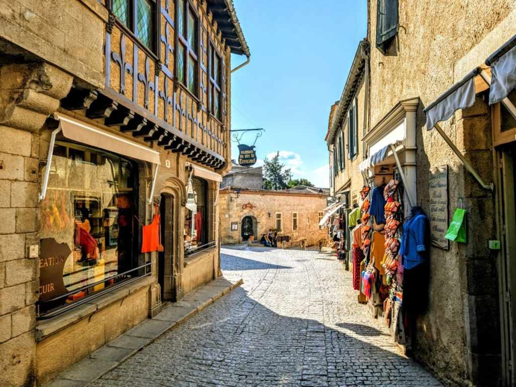 Picture of a street in the Medieval City of Carcassonne in Occitanie visited during French immersion program with Eliane